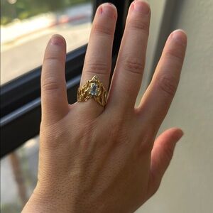 14KT Gold Ring with Light Blue Teardrop Stone